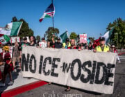 Protesters Fill Oceanside Intersection to Oppose ICE Activity