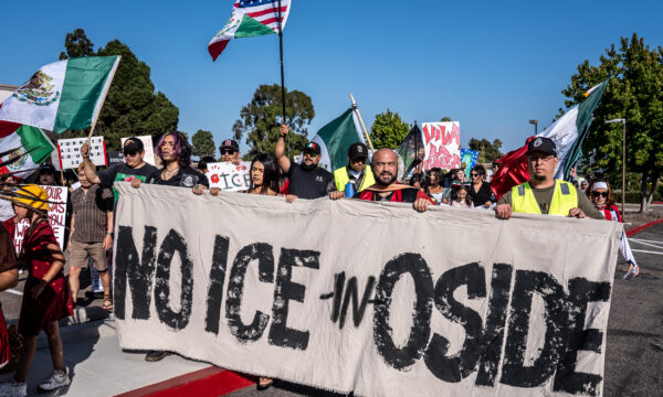 Protesters Fill Oceanside Intersection to Oppose ICE Activity
